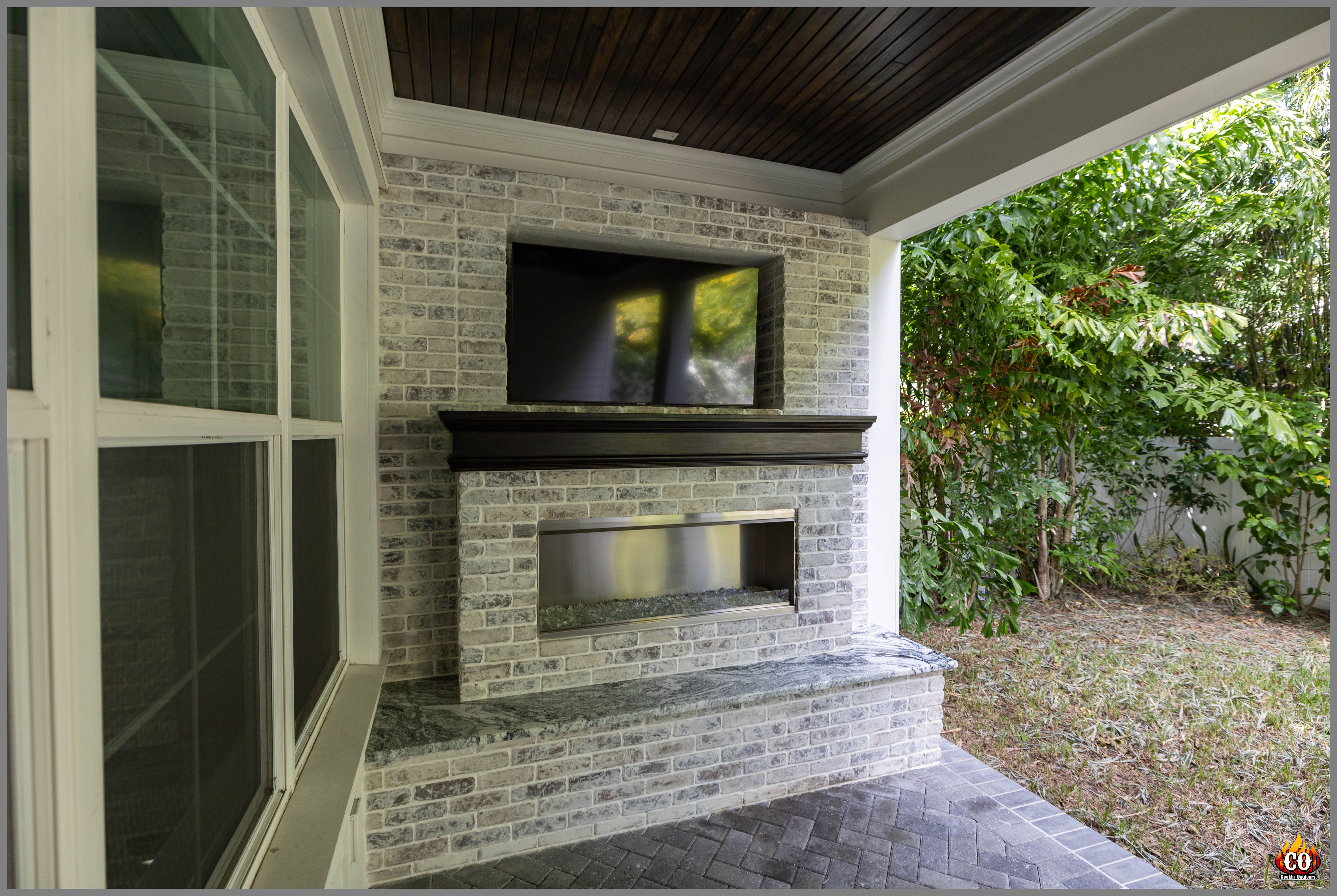 Concrete gas fireplace in South Tampa Lanai